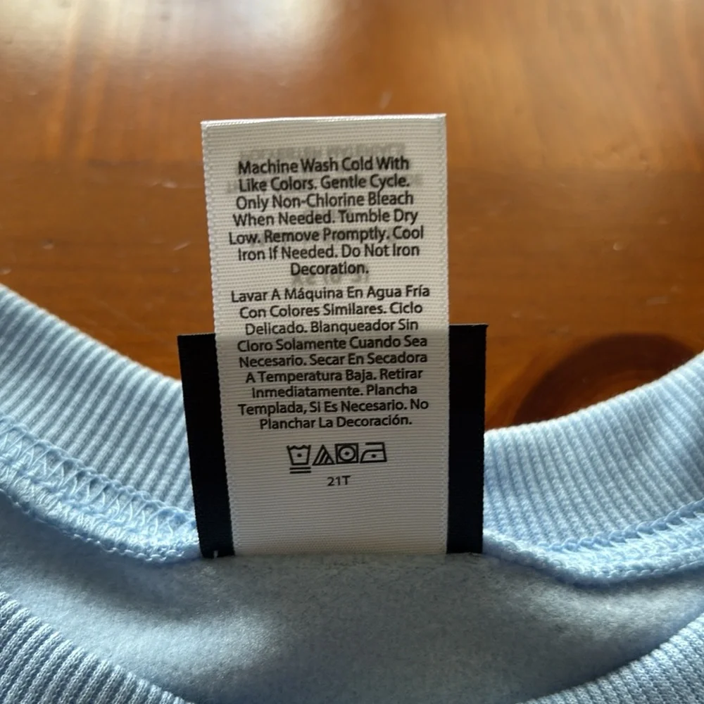 NWOT Disney Winnie the Pooh & Friends Allover Graphic Sweatshirt Light Blue XS - Picture 9 of 15